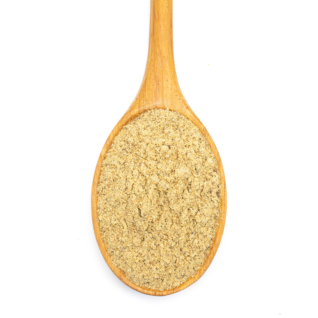 Quatre Epices Spice Blend in spoon